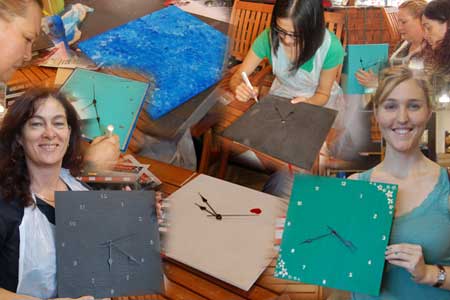 DIY Divas display some of their wall clocks that they made