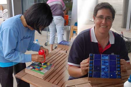 DIY Divas practise their skills at the tiling workshop